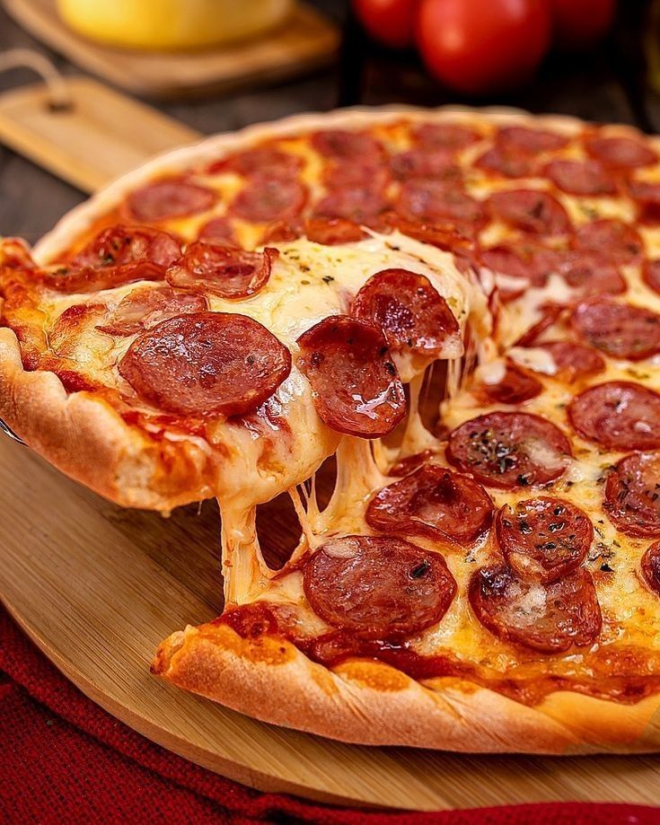 PIZZAS
